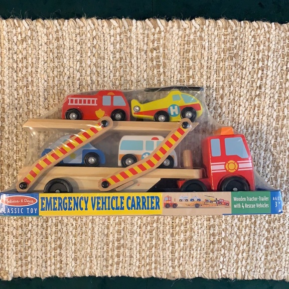 Melissa & Doug Wooden Emergency Vehicle Carrier Truck With 1 Truck and 4 Rescue - Picture 2 of 3